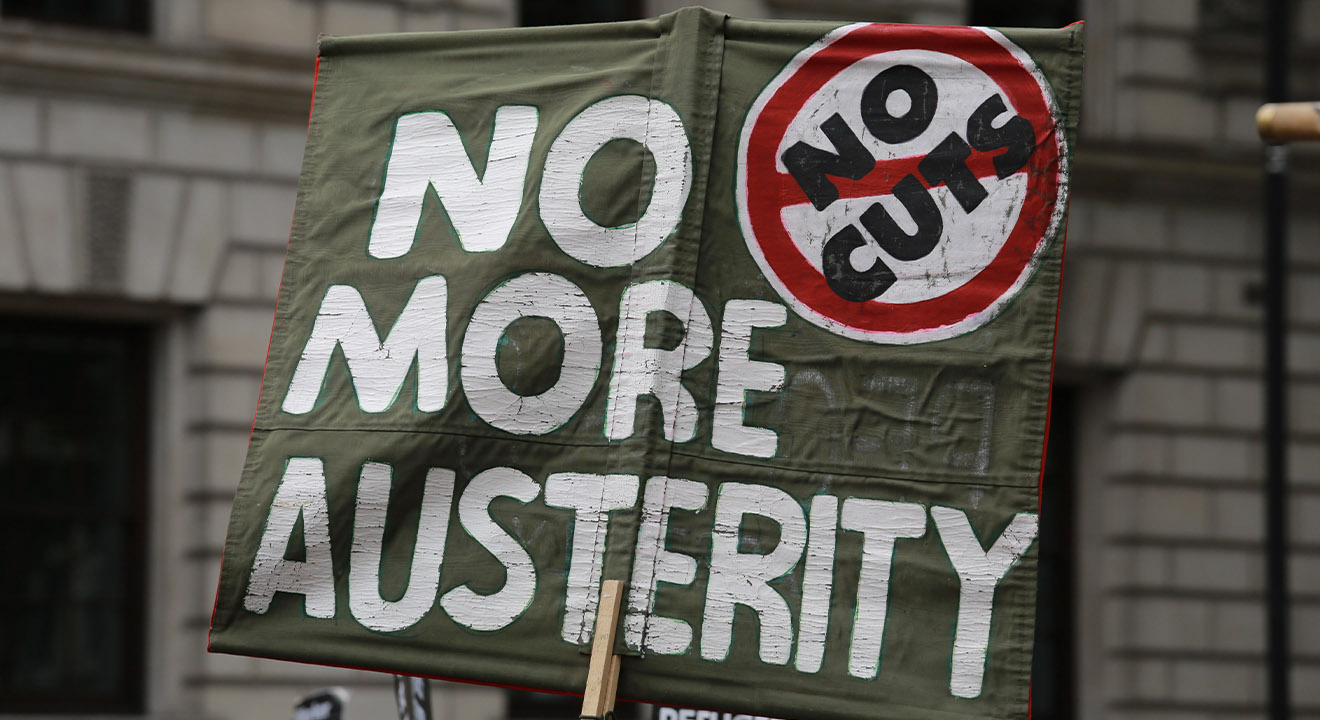 sign with message: No More Austerity